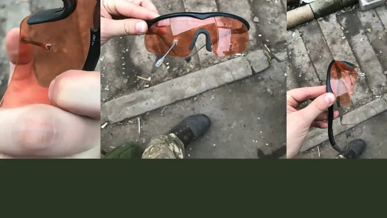 Okulary swisseye z przebiciem, które uratowały wzrok. Widoczny ślad po pocisku na soczewce.